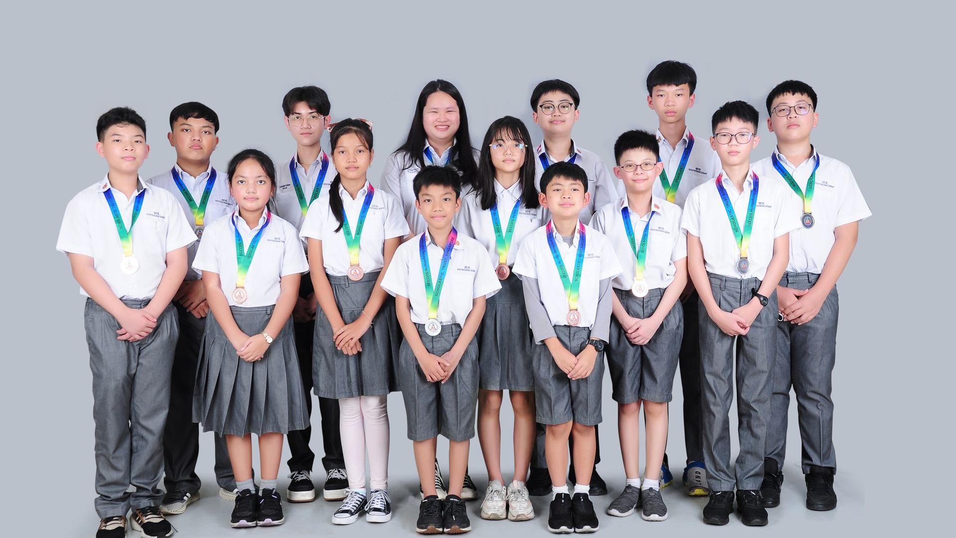 Students with competition medals